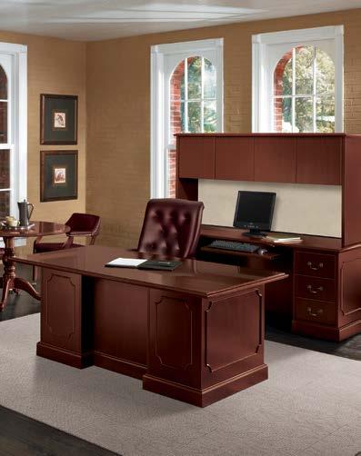 Shown in Mahogany laminate with traditional edges and Antique Brass handles. Park Avenue Collection Executive High-Back Chair and Wood Guest Chair shown in Sierra Vinyl Black and Mahogany finish.