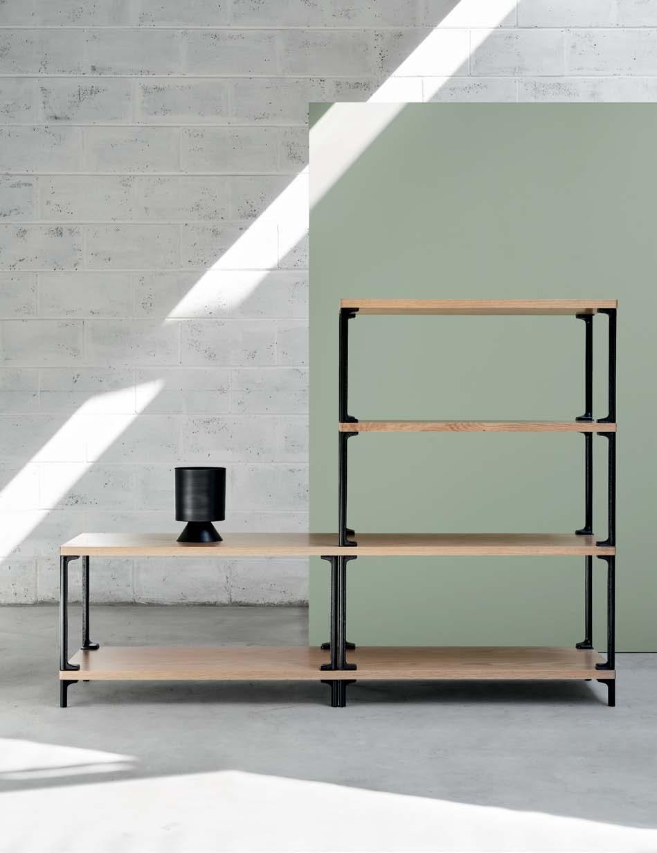 adam cornish frame frame in oak timber and black powdercoat 36 Named after its pared-back geometric language, Frame is a modular shelving system made with timber and cast metal joinery.