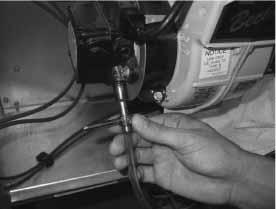 An assembly with a key to open the bleed port can be constructed like that shown in Figure 16. CHECKING THE PUMP PRESSURE The new Beckett burner assembly now includes a Clean-Cut shutoff pump.