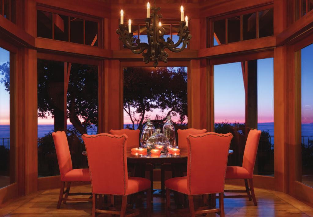 The formal dining room, located in the main pavilion, is surrounded by floor-to-ceiling windows, and, because it faces west toward the ocean, it s the perfect place to soak in the sunset.