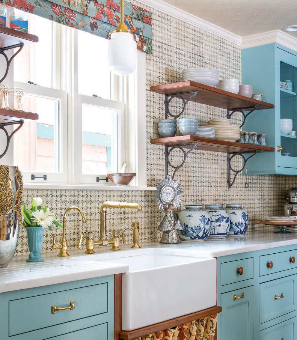 Below: Schumacher added colorful layers to the lively kitchen by covering the vent hood with Martyn Lawrence Bullard s Darya Ikat for Schumacher.