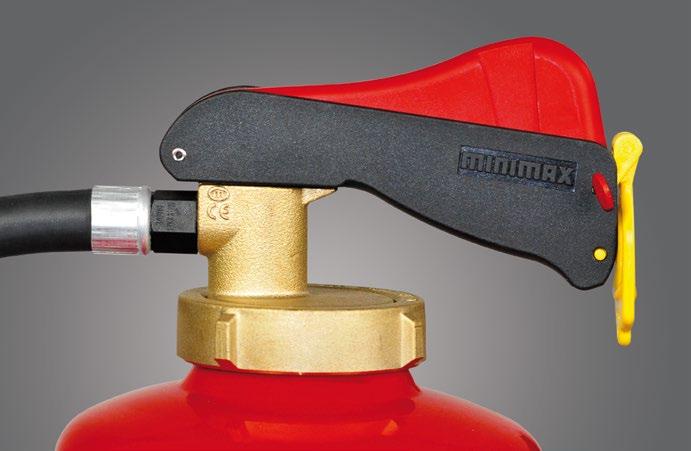 The yellow safety catch which has to be pulled before use is set apart like a signal from the rest of the portable fire extinguisher.