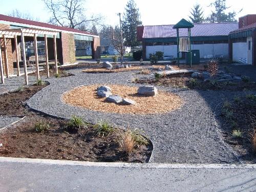 Figure 4: Completed Head Start play area STORMWATER CAPACITY AND SYSTEM COMPONENTS Stormwater Management Goal The stormwater facilities were designed