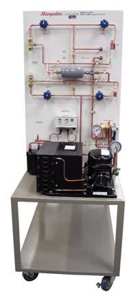 When the unit is energized, realistic system voltages display across actual and simulated devices. Combined audio and visual signals indicate a running compressor.