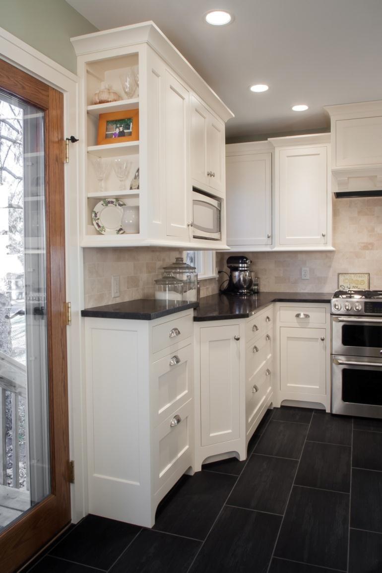 AFTER PHOTO: #5 The cabinets step back near the doorway to provide more circulation space; the