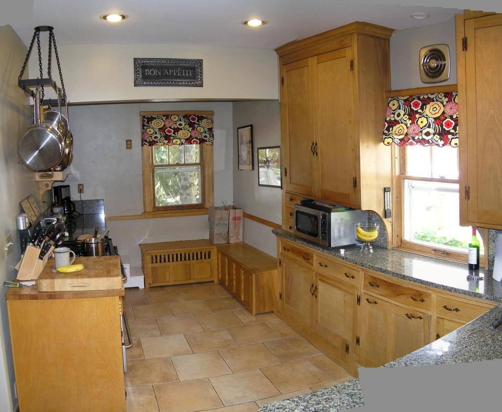 BEFORE PHOTO: #1 The dropped beam divided the old kitchen; shallow counters on the right
