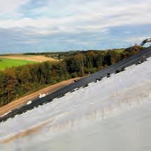 When installing a mineral drainage layer over a geosynthetic seal, a needle-punched nonwoven geotextile can replace the otherwise necessary sand protective layer atop a geomembrane.