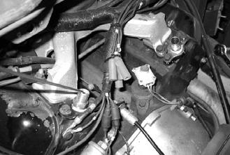 Apply gasket sealant to new coolant fittings before installing on engine block.
