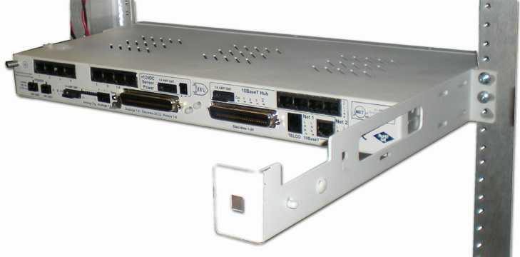 To begin installing the hinged pluggable back panel, the NetGuardian should be rack mounted.