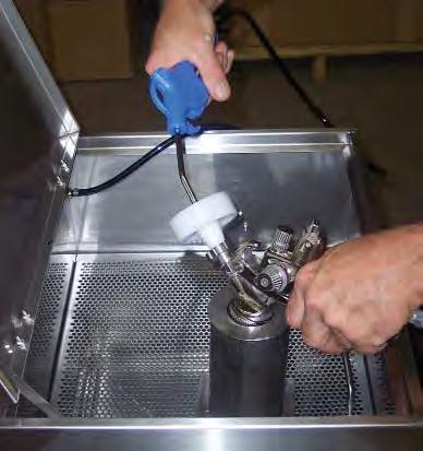 MANUAL - SPRAY GUN CLEANERS - UG5000W SERIES Revision 2013-02 After cleaning guns, remove the guns and cups from the tank and wipe them dry. Do not store spray guns in the tank.