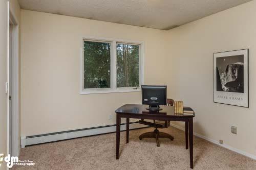 The bedroom next to the family room would be great as a home office.