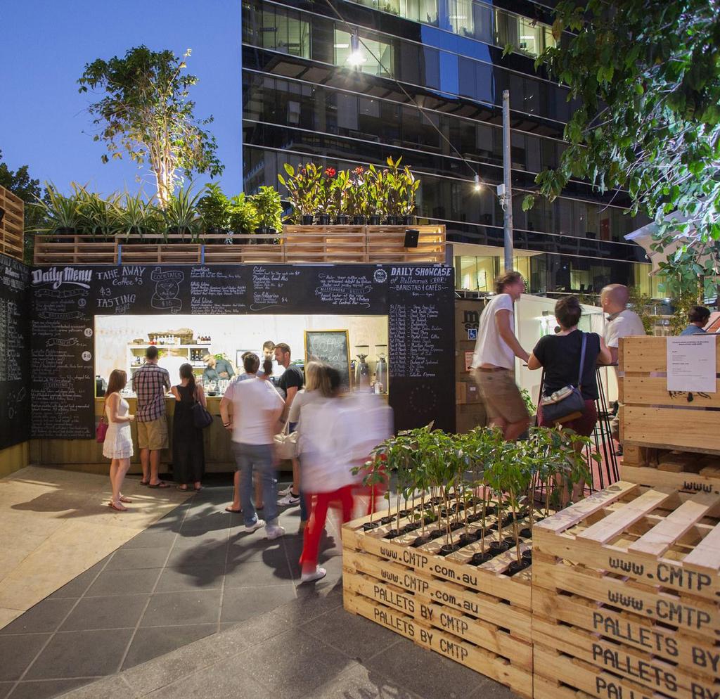 The architects design brings a jungle of coffee trees to the edge of a central business district.