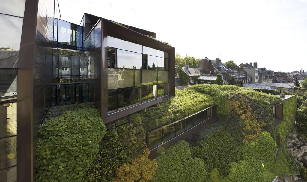 VERTICAL MICRO Landscape architects are beginning to use vertical gardens to reintroduce nature into man-made
