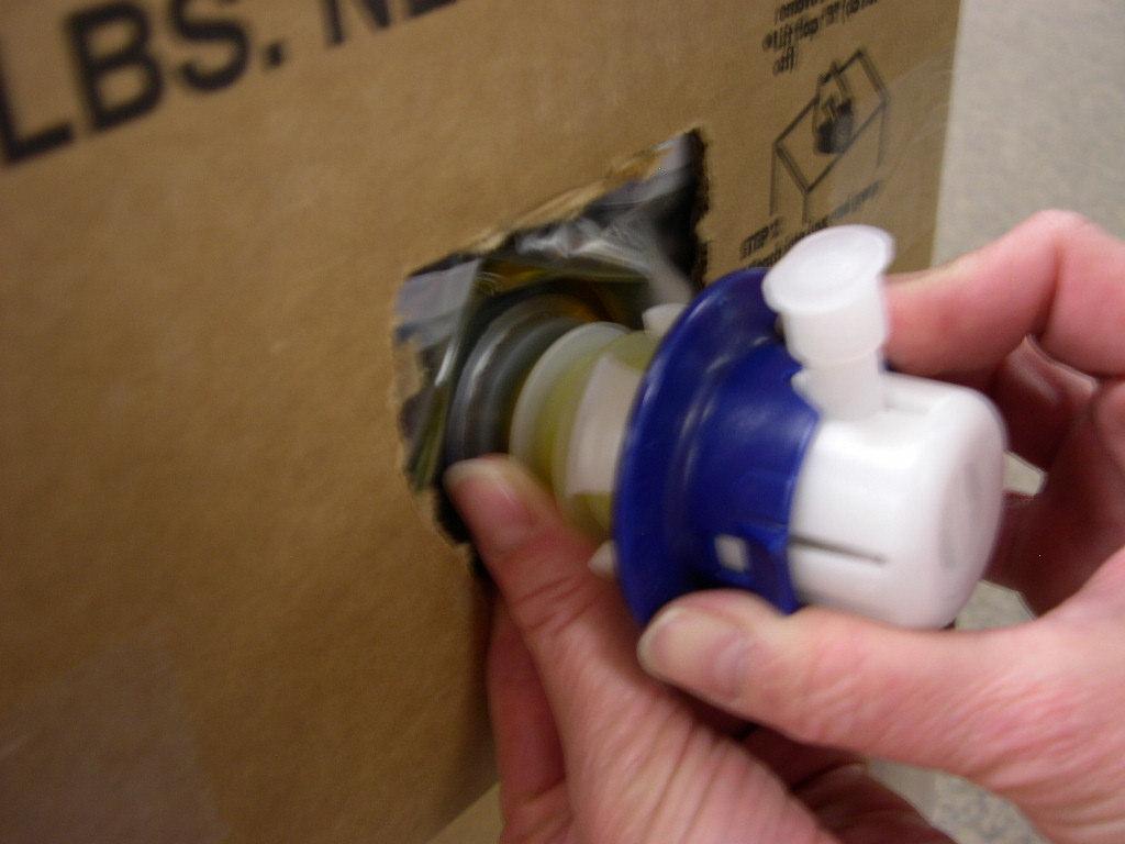 connector shell onto bag nozzle. 2.