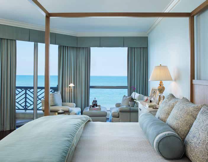 In the master bedroom, colorations were inspired by the view of the ocean. The cerused oak bed is dressed in custom linens. REPRINTED WITH PERMISSION VERO BEACH 6 different sitting areas.