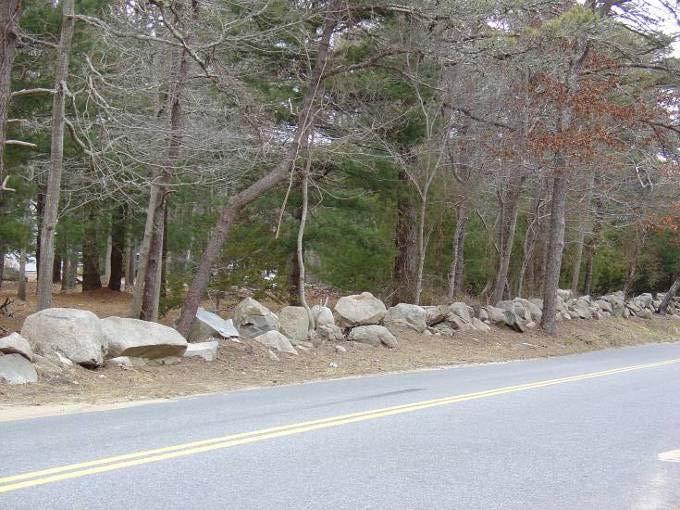 A stone wall along Tubman Road Most of Brier Lane is lined with stone walls Critical Concerns: Stone Walls Description Historic stone walls are found throughout Brewster along scenic roads, in fields