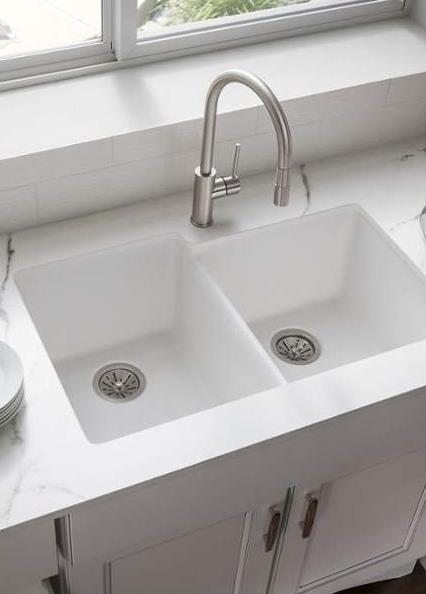 Composite Sinks A lot of modern sinks are being made from composite materials like quartz and granite fused with polyester or acrylic resins.
