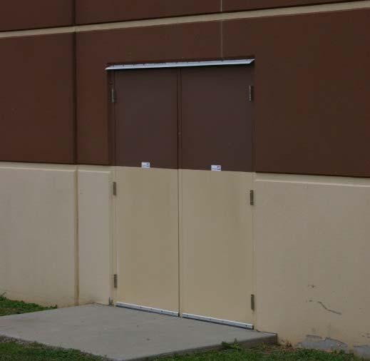 SG-7 Design secondary doors, such as emergency exit doors, to blend in with the building façade.