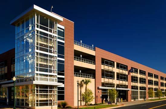Chapter 3 Parking P-1 Minimize the visual impacts of a parking structure by making it an attractive, compatible addition to a commercial area and by respecting the regular window pattern and other
