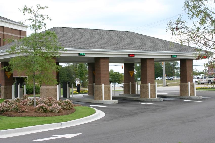 P-11 In buildings with drive-through lanes, locate drive-through and stacking lanes away from adjacent sensitive uses, such as residential and outdoor amenity areas, to reduce the impacts of noise