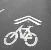 This should primarily be accomplished through the addition of on-street facilities consisting of bicycle lanes where space permits or bicycle shared lane markings or sharrows where there is not