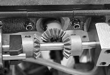 Remove the bevel gear cover and loosen the screws ➊, ➋ on the horizontal bevel gears and screw ➌ on the stop. ➒ 3. Loosen two adjusting screws ➍ in the right collar ➎.