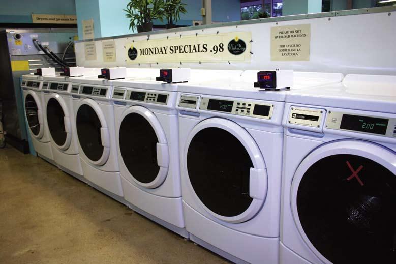 The store features six of Maytag s Next Generation high-efficiency front-load washers. On Mondays, these washers are specially priced at 98 INSET: No coins allowed in this store.