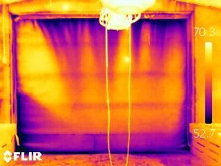 Figure 1.14 Thermal images of a leaky and well-sealed end door A. Leaky B. Sealed door Just because a broiler house has solid side walls does not mean that it is air tight (see Figure 1.