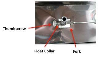 Align the long side of the float with the long side of the float box. c. Raise the regulator arm. d.