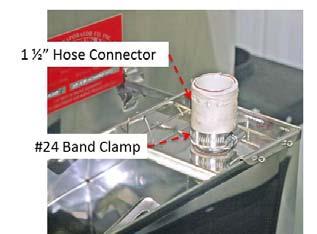 Slide the hose connector onto the float box bridge and place a #24 band clamp over the lower end of