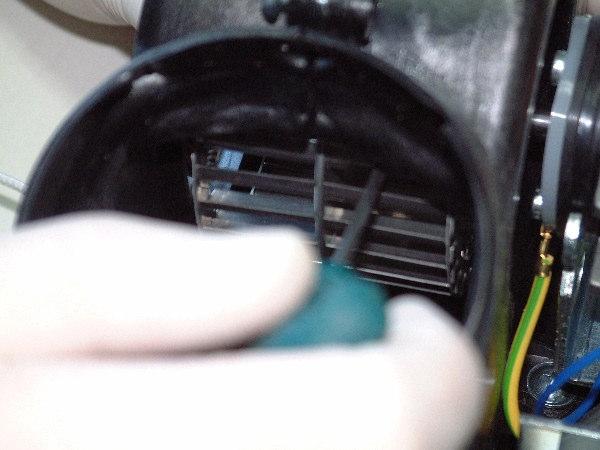 Step 4: Unscrew the fan wheel by inserting a number 4