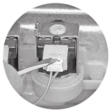 Lift the locking tabs with a small-blade screwdriver (see the top right photo), and pull the wire connectors out of the hot and cold water inlet valve solenoid terminal