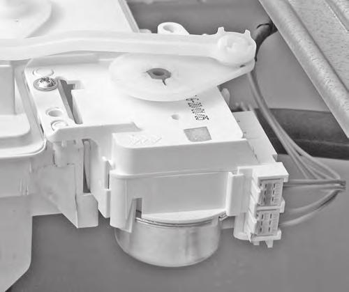 REMOVING THE DETERGENT DISPENSER MOTOR WARNING Electrical Shock Hazard Disconnect power before servicing. Replace all parts and panels before operating.