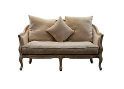 Modern sofa with unique gold cross bar legs with captione back.