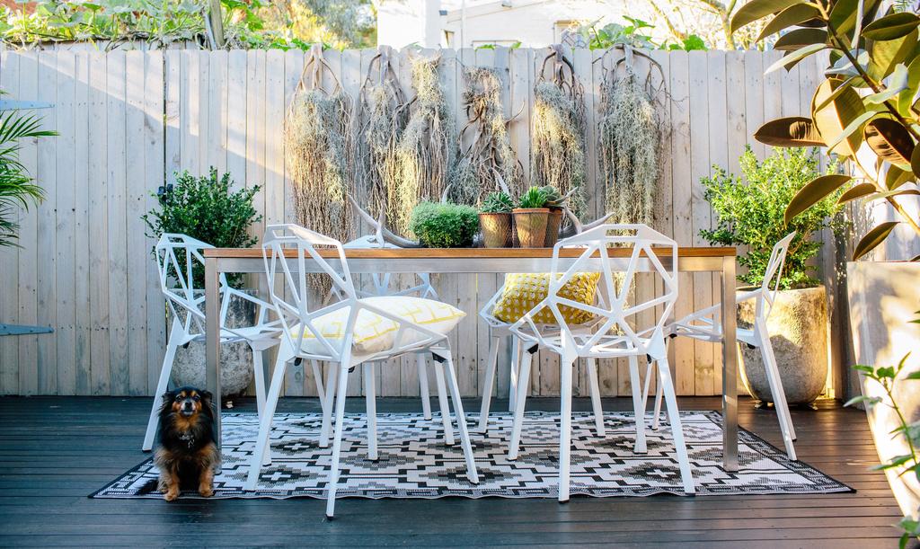 Outdoor living Hannah s terrace has been transformed into an outdoor living room complete with potted plants and
