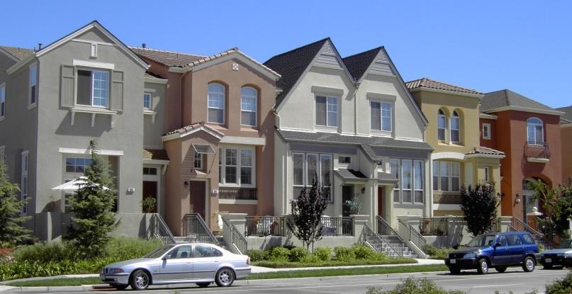 2 LAND USE AND DEVELOPMENT STANDARDS Rowhouse (Attached) Rowhouses are single-family dwelling units that are attached at their sides in groups of three or more.