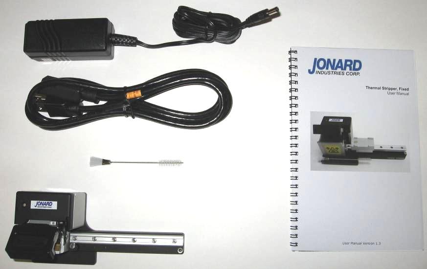 Components Components The standard Thermal Stripper kit contains the following items: Thermal Stripper unit A/C Power Supply and Cord Cleaning Brush User Manual