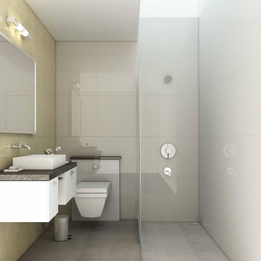 Bathroom Neat toilet designs for best space utilization Ceramic dado tiles for walls in all bathrooms, stone fascia on window sills Stone fascia for counter in ground floor bathroom Counter-top basin