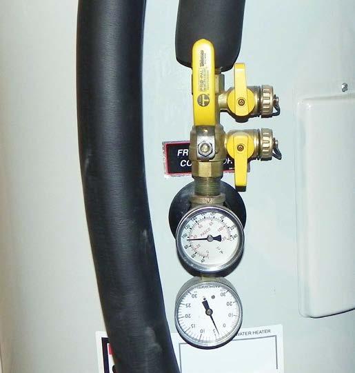 The pink electrical cable is the 240 VAC electricity for backup water heating.