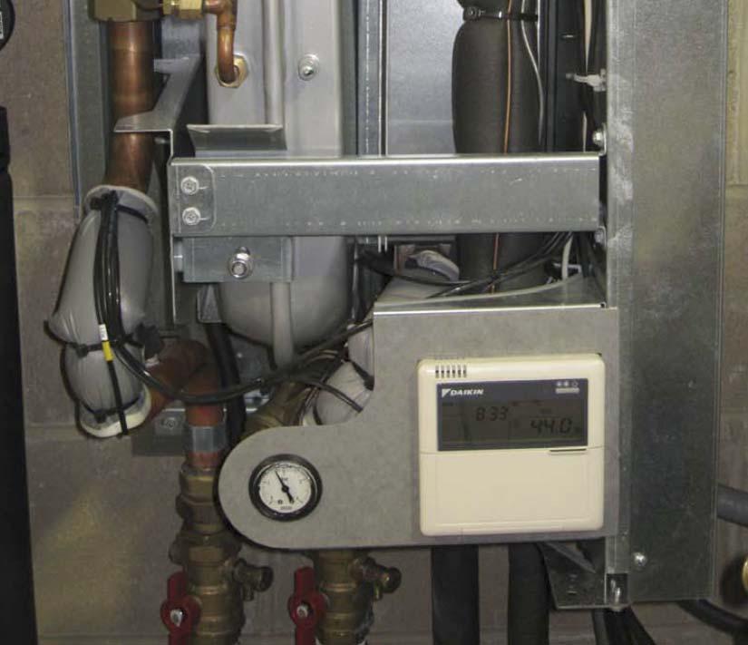 Plumbing and refrigeration connections enter the bottom of the hydro-box, requiring that it be mounted at least 12-18 inches off the floor.