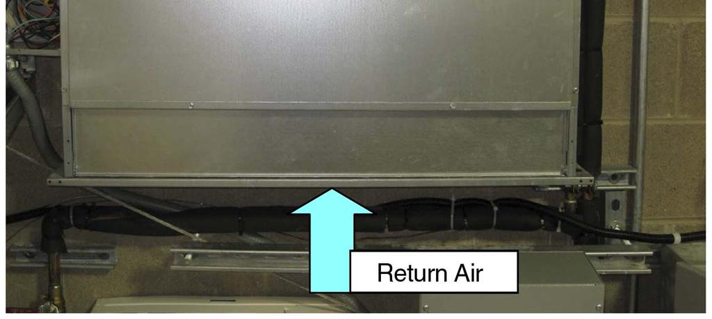 The air handler (Figure 3-2) was mounted above the hydro-box on the same wall and drew return air from the lab space.