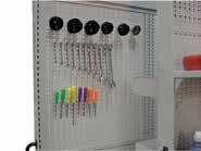 Smart Wall storage panels accommodate a variety of tools. Storage layouts can be customized using a variety of accessories including hooks, shelves and parts bins.