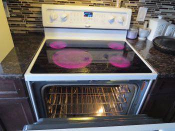 5. Stove Top & Oven Condition. At the time of inspection the electrical stove top & oven functioned. Ceramic cook top.