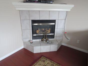 Fire Place 1. Fireplace Type & Condition. Natural gas metal insert direct vent fireplace. On/off by an electrical wall switch.