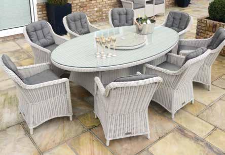 1cm Round Dining Table, 4 x Dining Armchairs Optional Extra: 2.5m Parasol.