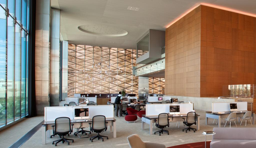 Top: Floor to ceiling windows flood the KAUST library with light and offer a spectacular view of the Red Sea.