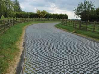 The sub-base is overlaid with a Terram geotextile filter/separator (e.g. T1000) followed by 20mm of coarse sand as a bedding layer for the pavers.