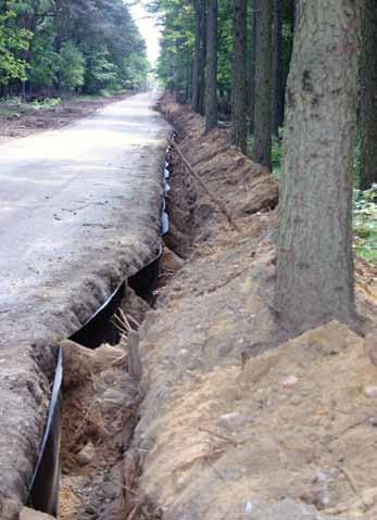 TERRAM ROOTGUARD Root control barrier to protect buildings, walls, paths, access roads, drainage pipes and underground cables from root damage.