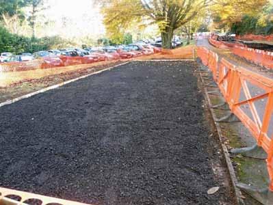 ROOTSTONE Permanent blended aggregate/rootzone load-bearing sub-base for the support and sustainability of grass fire lanes, car parks and access roads.
