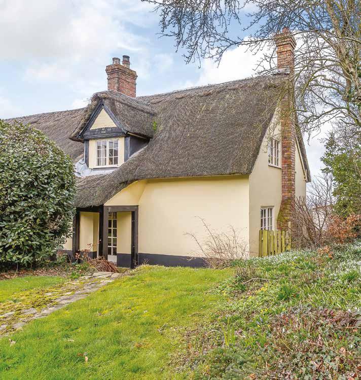 With exposed beams, open fires, ledger-and-brace doors through the house (which have been recently stripped and re-finished) handmade for the cottage, a charming open plan kitchen/breakfast area,
